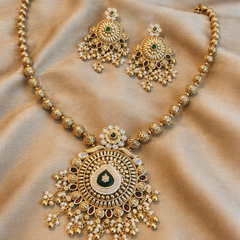 Classic Kundan Pearl Jewellery Set with Green and Red Highlights