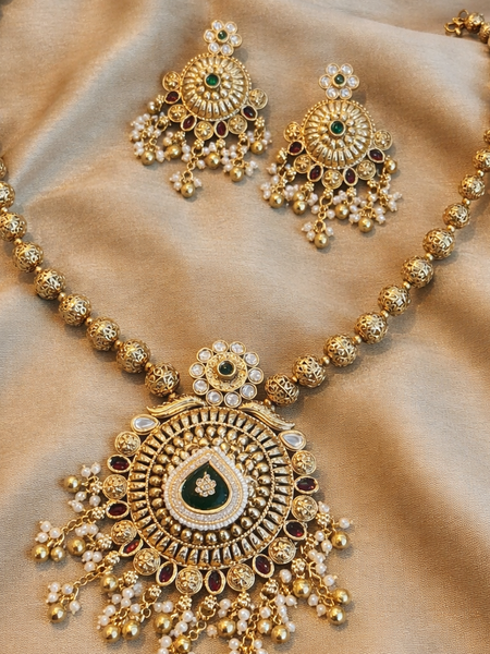 Classic Kundan Pearl Jewellery Set with Green and Red Highlights