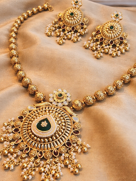Classic Kundan Pearl Jewellery Set with Green and Red Highlights