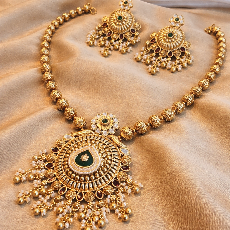 Classic Kundan Pearl Jewellery Set with Green and Red Highlights