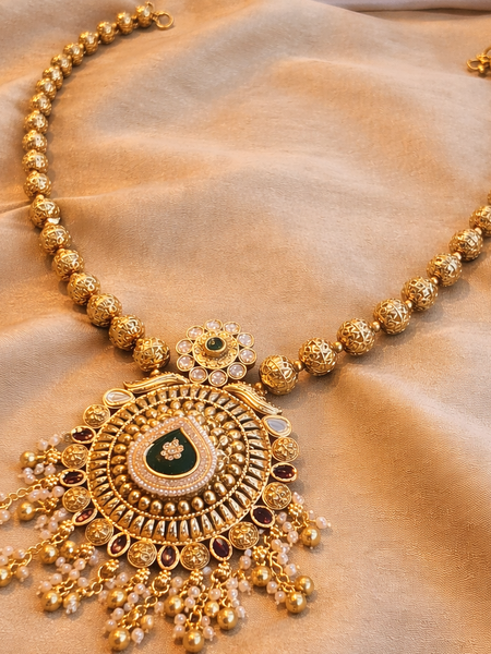 Classic Kundan Pearl Jewellery Set with Green and Red Highlights