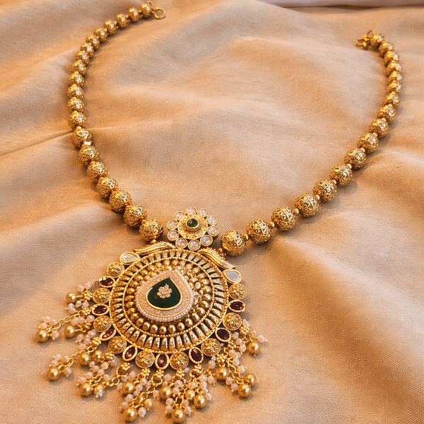 Classic Kundan Pearl Jewellery Set with Green and Red Highlights