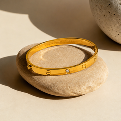 sleek gold-tone bangle bracelet | Bracelet for Women