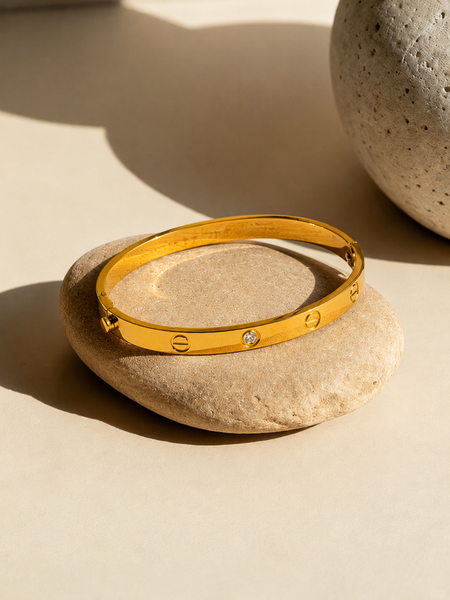 sleek gold-tone bangle bracelet | Bracelet for Women
