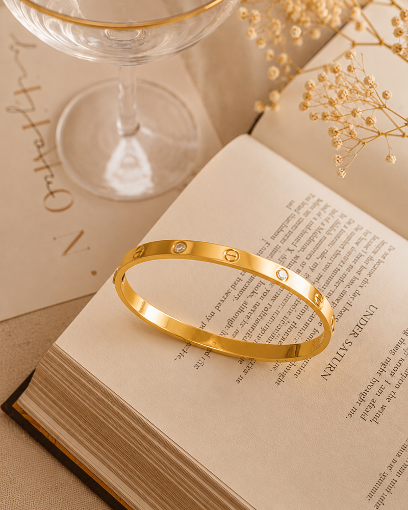 sleek gold-tone bangle bracelet | Bracelet for Women