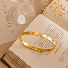 sleek gold-tone bangle bracelet | Bracelet for Women