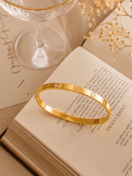 sleek gold-tone bangle bracelet | Bracelet for Women